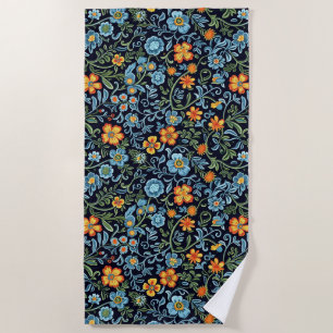 Komplexe Blumenkunst: Blaue und orangefarbene Blum Strandtuch