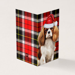 König Charles Spaniel mit Kariertem Weihnachtsfeie