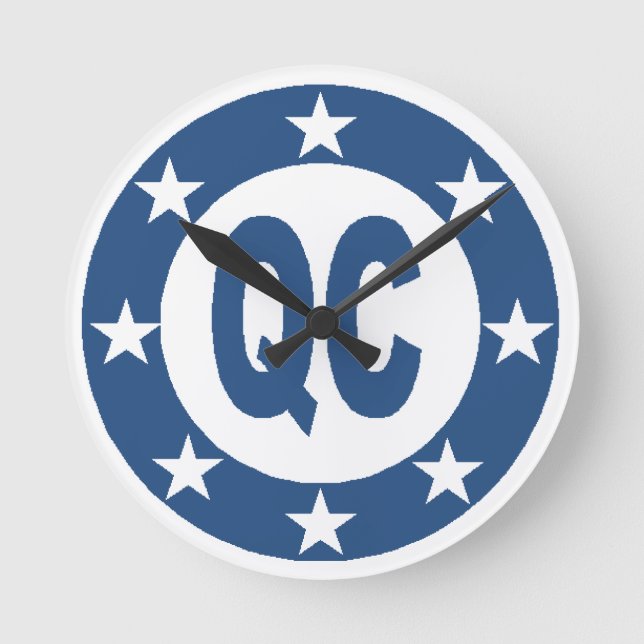 KONZENTRIERUNGSQUEBEC RUNDE WANDUHR (Vorderseite)