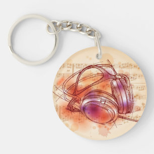 Kopfhörer auf einem Aquarellhintergrund u. Schlüsselanhänger