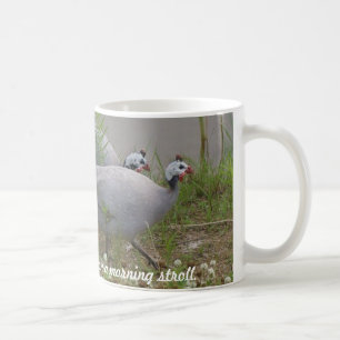 Korallen-u. Lavendel-Guinea auf einem Morgen… Tasse