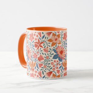 Korallen- und Blaugrüne Gartenzierblumen auf sanft Tasse