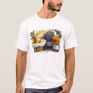 Korb mit Croissants und Schokoladenbroten. T-Shirt