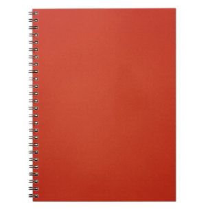 Körniger warmer roter Hintergrund Notizblock