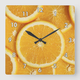 Köstliche Orangenscheiben Quadratische Wanduhr