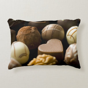 Köstliche Schokoladenpralinen Dekokissen