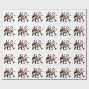 Krampus und Santa spielen elektrische Weihnachtsgi Geschenkpapier