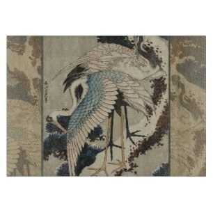 Krane auf einer schneebedeckten Pine Hokusai Schneidebrett