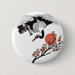 Kranvogel und blühende Sakura Button