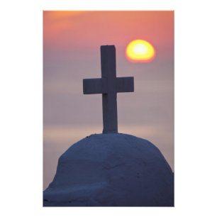 Kreuz auf der Spitze einer Kirche bei Sonnenunterg Fotodruck