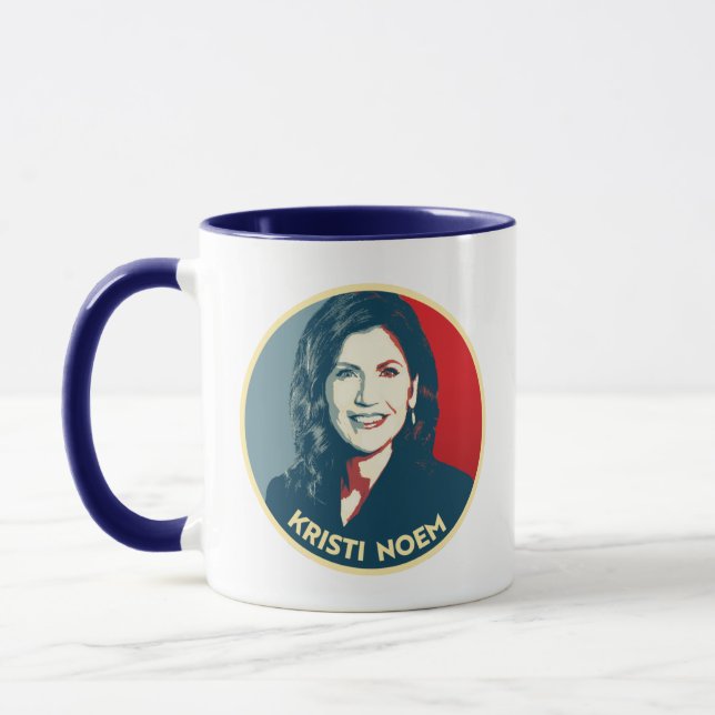 KRISTI NOEM Propaganda Abzeichen Tasse (Links)
