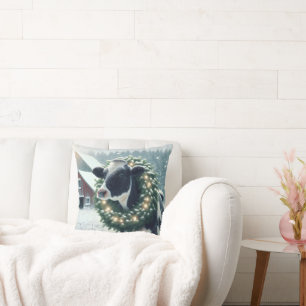 Kuh trägt einen leichten Weihnachtsschaden Kissen