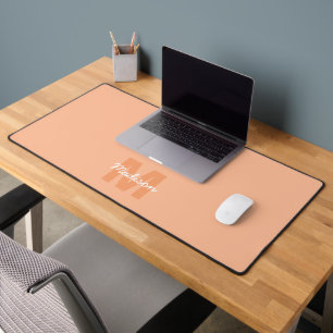 Kühle Pastell-Pfirsichfarbe mit individuellem Mono Schreibtischunterlage