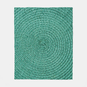 Künstliche geflochtene grüne Stofftextur. Fleecedecke