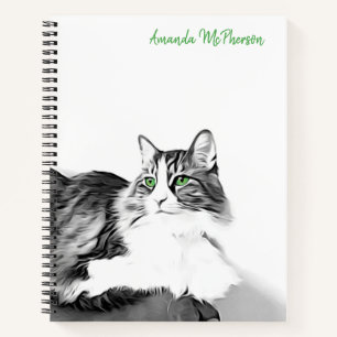 Kunststilistisches Katzenportrait mit grünen Augen Notizbuch