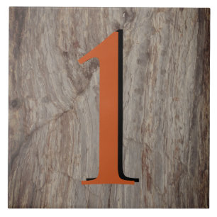 Kupfer Glow House Number Tile 1 auf grauem Stein Fliese