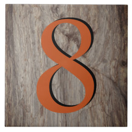 Kupfer Glow House Number Tile 8 auf grauem Stein Fliese