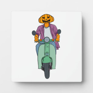 Kürbis-Reiter auf Mint-Scooter Fotoplatte