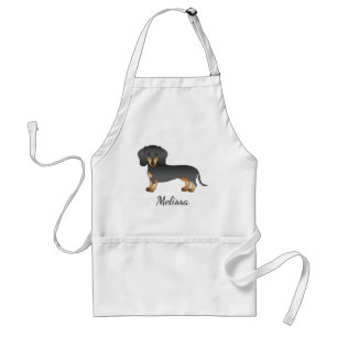 Kurze Dackel aus schwarz und tan Niedlich Hund und Schürze