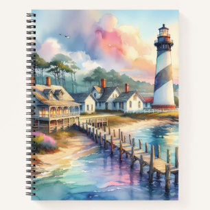 Küstenszene mit Leuchtturm und Strandhäuschen Notizbuch