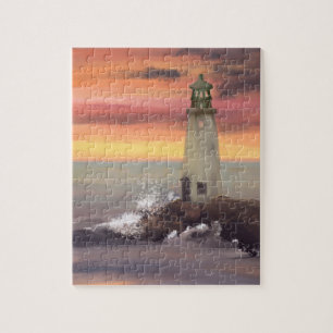 Küstenteuchtturm mit rosa und orangefarbenem Himme Puzzle