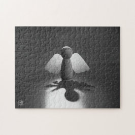 Kwetsbaarheid en breekbaarheid symbolic in Engel. Puzzle
