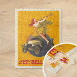 La 15 hp Bellanger | Leonetto Cappiello Puzzle<br><div class="desc">La 15 hp Bellanger (1921) | Das 1921 erschienene Werbeplakat von Leonetto Cappiello für La 15hp Bellanger erweckt die Aufmerksamkeit mit einem kühlen und fantasievollen Design. Es zeigt eine Frau in einem fließenden gelben Kleid, sitzt auf einem Globus und bläst ein Horn, um die Ankunft eines Bellanger Autos zu verkünden,...</div>