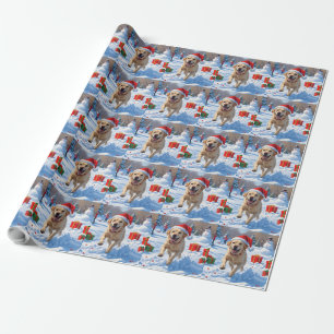 Labrador-Hund läuft im Schnee mit Weihnachtsmütze Geschenkpapier