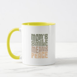 Lächeln der Mutter bedeutet Frieden – Grüner & Mar Tasse