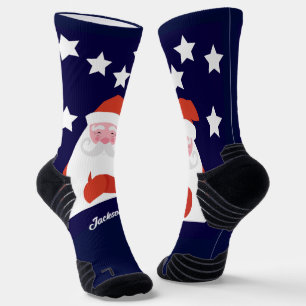 Lächelnder Weihnachtsmann und Sterne auf Blau Socken