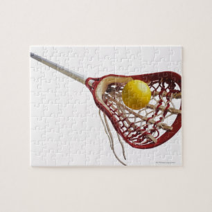 Lacrosse stick und Kugel Puzzle