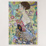 Lady mit einem Fan, Gustav Klimt Puzzle<br><div class="desc">Gustav Klimt (14. Juli 1862 - 6. Februar 1918) war ein österreichischer symbolischer Maler und einer der prominentesten Mitglieder der Wiener Sezessionsbewegung. Klimt ist bekannt für seine Gemälde, Wandgemälde, Skizzen und andere Kunstobjekte. Neben seinen figurativen Werken, die Allegorien und Portraits enthalten, malte er Landschaften. Unter den Künstlern der Wiener Sezession...</div>