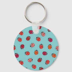 Ladybugs, blauer Hintergrund, bezauberndes, nahtlo Schlüsselanhänger