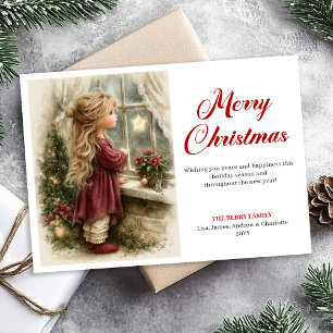Ländliches kleines Mädchen, das auf Weihnachtsmann Feiertagskarte