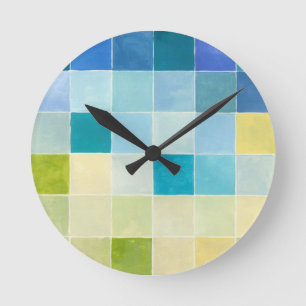 Landschaft mit mehrfarbigen, pixeligen Quadraten Runde Wanduhr