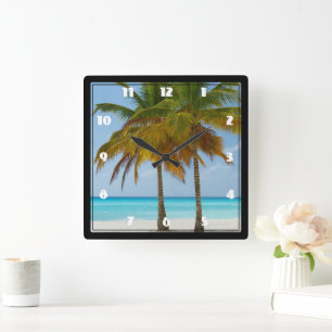 Landschaftliche Palmen an einem tropischen Strand Quadratische Wanduhr