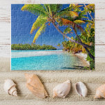 Landschaftliche Sicht auf Cook Island Beach | Trop Puzzle<br><div class="desc">Erleben Sie die atemberaubende Schönheit der Cook Islands mit diesem atemberaubenden Puzzle. Das Foto vereint das Wesen dieser idyllischen Inseln mit einem malerischen Strand, umgeben von überwucherten Kokospalmen, türkisblauem Wasser und dem klaren blauen Himmel. Wenn Sie dieses Rätsel zusammenspielen, werden Sie das Gefühl haben, zu den ruhigen Küsten des Südpazifiks...</div>