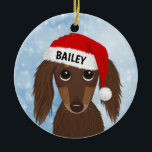 Langhaarige Schokolade Dackel Santa Individuelle N Keramik Ornament<br><div class="desc">Ein bezauberndes, langhaariges Weihnachtsschokoladenschmuck, das mit dem eigenen Text personalisiert werden kann. Fügen Sie einen Namen für ein lustiges individuelles Geschenk hinzu. Schmuckstücke, die auf dem Weihnachtsbaum noch für viele Jahre ausgestellt werden. Besuchen Sie Jenn’s Doodle World für noch mehr Urlaubsgeschenke mit diesem niedlichen Dackel Hund Design und Hunde züchten...</div>