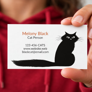 Langhaarige schwarze Kitty-Katze mit dem langen Visitenkarte