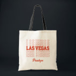 Las Vegas Bachelorette Bridesmaid Tasche<br><div class="desc">Machen Sie sich mit dieser farblich anpassbaren Begrüßungstasche auf ein unvergessliches Hochzeitserlebnis in Las Vegas vorbereitet! Es ist die perfekte Geschenkidee, die die Gäste gewollt werden, um behalten. Diese schlanke und praktische Tasche enthält neben den Worten "Las Vegas" auch Ihre Namen und Ihr Datum. Die Farbe ist im Zazzle-Editor vollständig...</div>