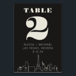 Las vegas Casino Skyline Wedding Tischnummer<br><div class="desc">Eine lustige und moderne Las Vegas Casino Skyline Wedding Tischnummer Karte, die eine individuelle Touch zu Ihrem Event in Las Vegas hinzufügen wird! Diese Tischnummer bietet ein modernes Las Vegas Skyline-Rendering und einen vollständig anpassbaren Schriftart und Text auf grafischem schwarzem Hintergrund. Perfekt für ein trendiges, modernes oder klassisches traditionelles Event...</div>