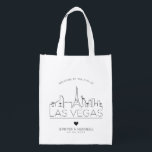 Las Vegas Wedding | Stilisierte Skyline Wiederverwendbare Einkaufstasche<br><div class="desc">Eine einzigartige Hochzeitstasche für eine Hochzeit in der schönen Stadt Las Vegas. Diese Tasche zeigt die einzigartige Skyline der Stadt mit ihrem Namen darunter. Anschließend erhalten Sie Informationen zu Ihrem Hochzeitstag in einem passenden,  offenen Stil.</div>