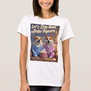 Lasst uns zu Hause bleiben und Pupcorn-Cartoonhund T-Shirt