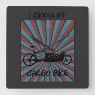 Lastenrad im Auge mit Strahlen und Spruch Quadratische Wanduhr