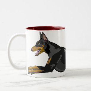 Laufender Dobermann, schwarz Zweifarbige Tasse