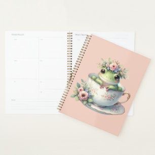 Launiger Frosch in floraler Teetasse Planer