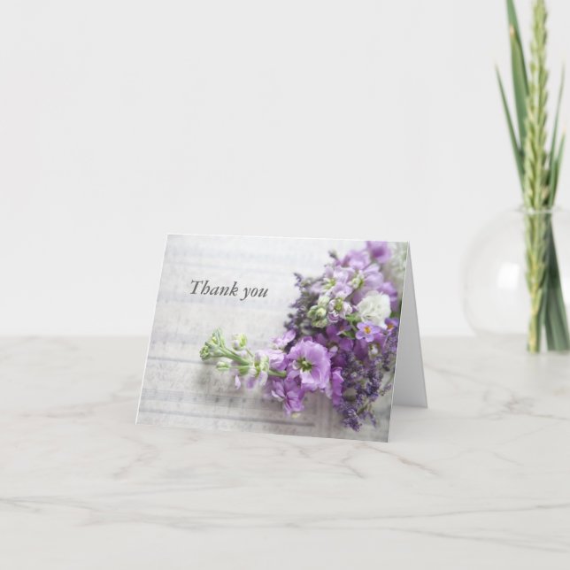 lavenderfarbene Blume auf der alten Musik danke (Vorderseite)