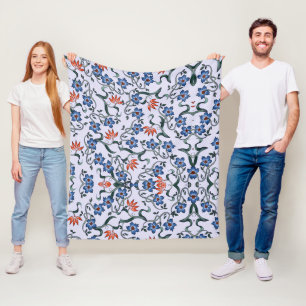 Lebendige blaue Blumenmuster mit grünen Reben Fleecedecke