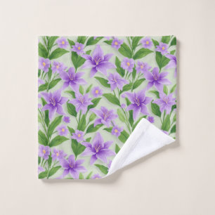 Lebendige lila Lilien mit grünen Blättern Waschlappen