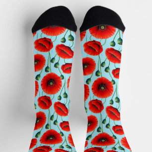 Lebendige rote Mohnblumen auf einem hellblauen Hin Socken